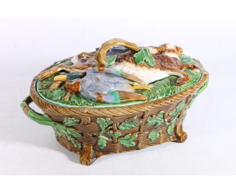 Minton Majolica pottery game tureen, the lid decorated with relief hare, duck and bird having rustic tree branch handle, the 