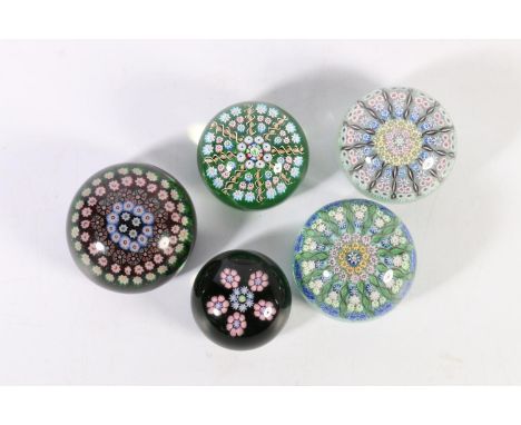 Five Scottish art glass paperweights including a millefiori example probably Paul Ysart Moncrieff of Perth, a Stuart Drysdale