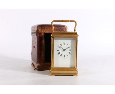 French brass four glass repeater carriage clock having white enamelled dial with Roman numerals, the movement striking on a b