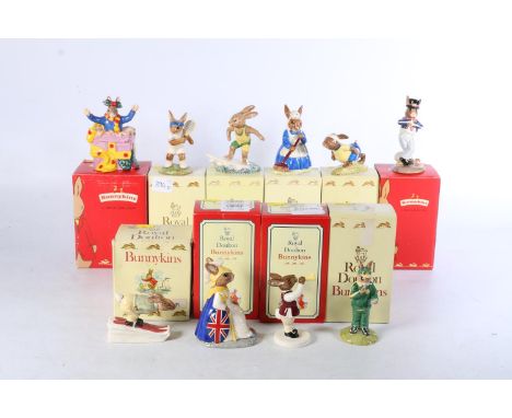 Ten Royal Doulton Bunnykins models including ACE Bunnykins DB42, Aussie Surfer Bunnykins DB133, Mrs Bunnykins Clean Sweep D86