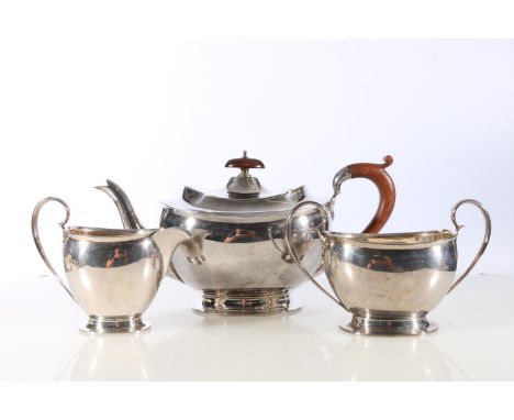George V sterling silver three piece tea service of plain form, Adie Brothers, Birmingham, 1096g. 