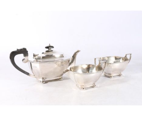 George V Art Deco three piece sterling silver tea service comprising a teapot, a sugar bowl and a jug, S Blacnkensee &amp; So