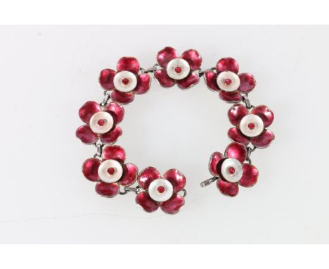 Bernard Instone (1891-1987) silver and pink enamel bracelet, with stylised floral design, stamped B I silver, 17.5cm long. 