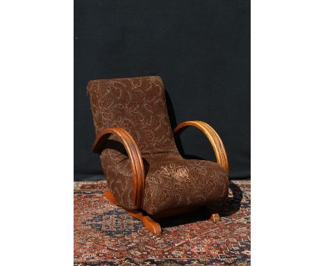 Art Deco American oak frame rocking chair, on trestle base, in the manner of a banana chair, the springs stamped 'SENG CHICAG