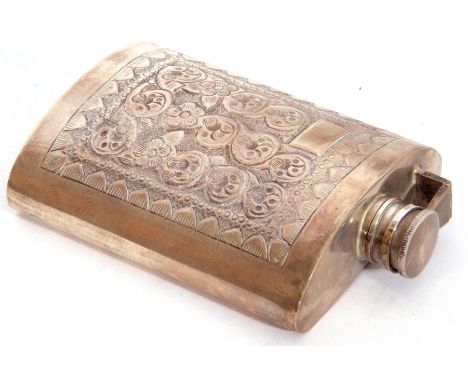 Foreign white metal hip flask of curved rectangular form with screw down hinged lid, embossed with panels of floral designs, 