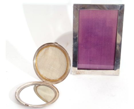 George V plain rectangular silver mounted photograph frame with wooden easel back, 15cm x 10cm, Birmingham 1931, together wit