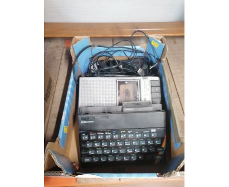 A Sinclair ZX Spectrum and cassette recorder   