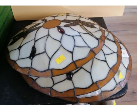 Three Tiffany style dragonfly patterned ceiling light shades.