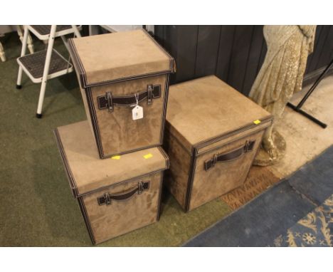 Three light brown suede effect storage boxes