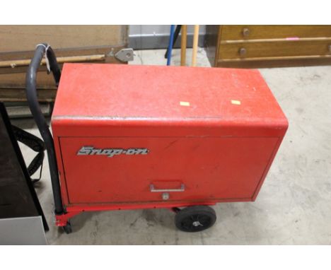 Snap On toolbox and a red metal trolley