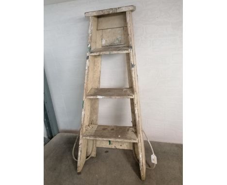 A three tread set of vintage step ladders 
