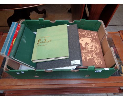 Box of assorted Commonwealth and World Stamp albums inc. Swift sure, Stanley Gibbons International etc.      