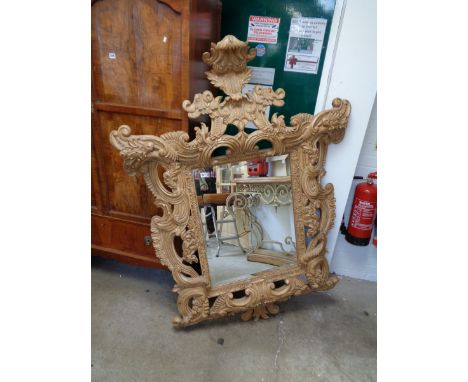 20thC Ornate Foliate wall mirror with bevelled glass and panel back          