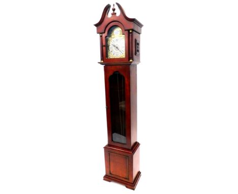 A late 20thC/early 21stC longcase clock, in mahogany case, the arched dial stamped Tempus Fugit Westminster Germany, the case