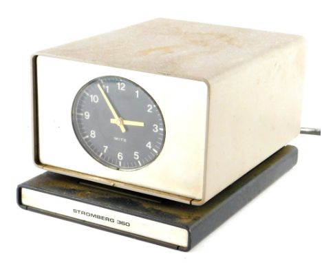 A small electric Stromberg 360 mite time recorder, in grey and black painted case embellished with brushed steel, 15cm wide.