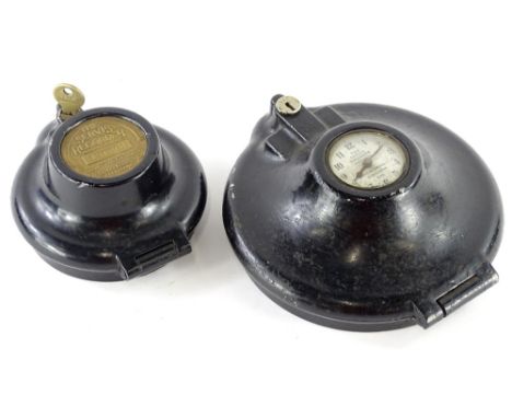 A service recorder clock, the silver coloured dial stamped Service Recorders Ltd Gloucester England, with outer metal casing 