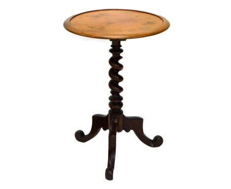 A Victorian mahogany occasional table, the circular dished top on a spirally turned column and tripod base, 48cm diameter.