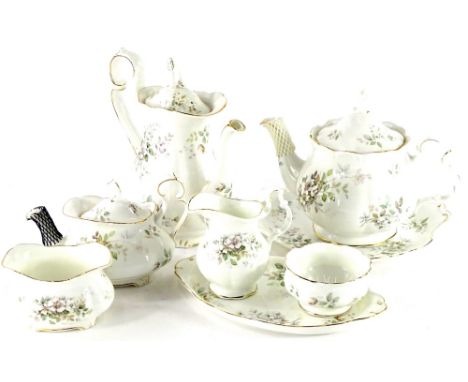 A Royal Albert Haworth pattern part tea service, to include small tea pot and cover, water jug and cover, two sugar bowls, et