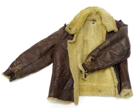 A vintage brown leather flying jacket, with label for US Army Air Force, made by the Aero Leather Clothing Company, size 42 r