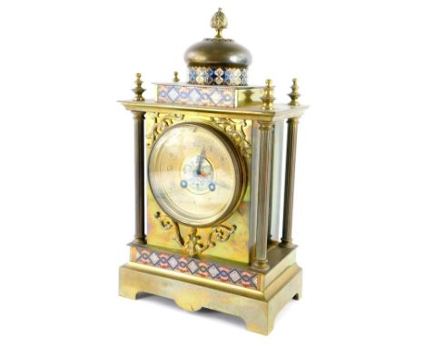 A late 19thC French brass and champleve enamel Arabic style mantel clock, the dial with blackened Arabic numerals, the domed 