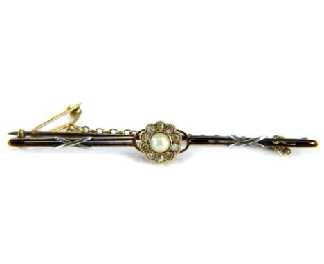 A Victorian bar brooch, set with central cultured pearl, surrounded by tiny old cut diamonds, forming a daisy cluster, on a t