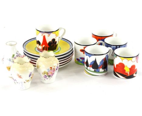 Various Clarice Cliff centenary coffee cans and saucers, made by Wedgwood, a pair of Royal Doulton small vase, with printed d