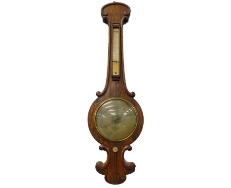 Andrews, Grantham. A Victorian rosewood wheel barometer, with thermometer and silvered dial, 91cm high. (AF)