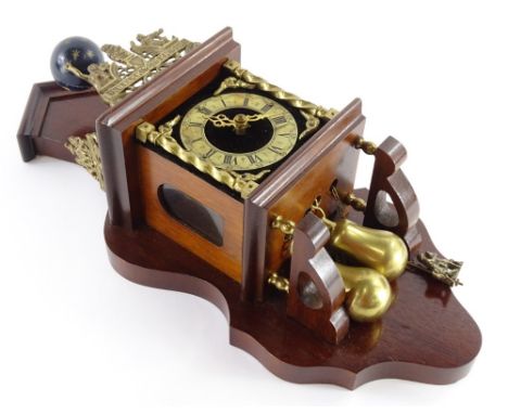 A Dutch Zaan mahogany wall clock, with brass mounts of a gentleman holding a globe, a pierced plaque bearing the motto Elck S