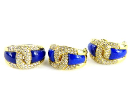 A set of lapis and diamond set jewellery, comprising ring and a pair of earrings, the ring with central cross over design set