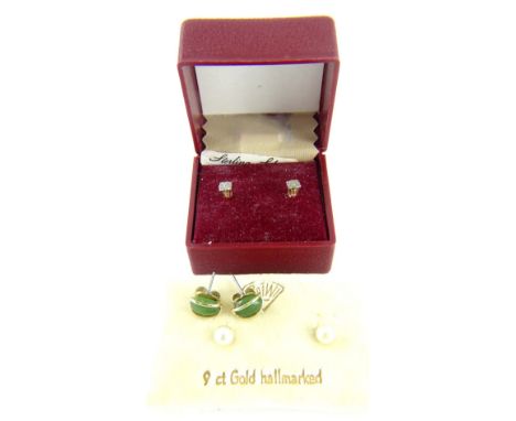 Three pairs of earrings, comprising a pair of 9ct gold and platinum stud earrings, a pair of 9ct gold and cultured pearl earr