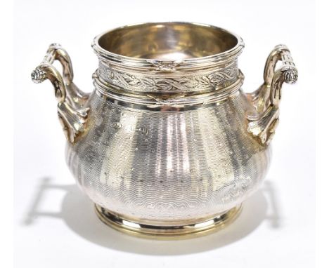 A Continental silver twin handled sugar bowl with cast rim above engine turned decoration, with import marks for Elkington &a