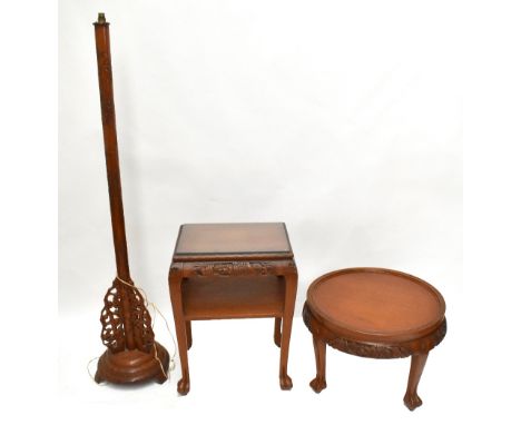 Two Chinese teak occasional tables, the first with glass top and under tier, height 72cm, width 54cm, depth 41.5cm, the secon