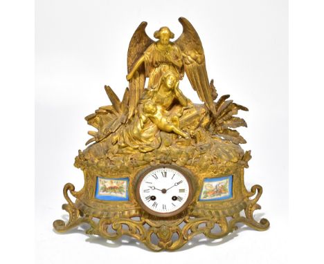 A 19th century French ormolu mantel clock with cast&nbsp;decoration&nbsp;depicting the angel Gabriel above Mary and Joseph, m