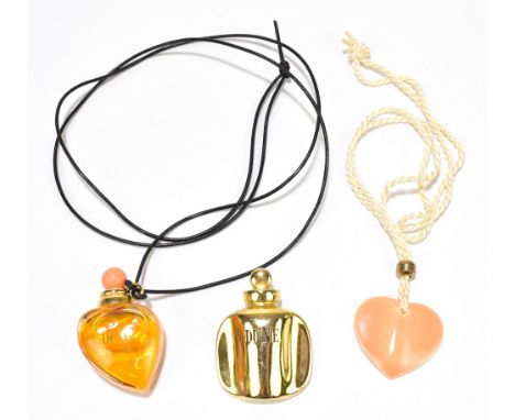 CHRISTIAN DIOR; a ceramic light orange necklace with rope string chain, length 60cm, and stamped Parfum Christian Dior to the