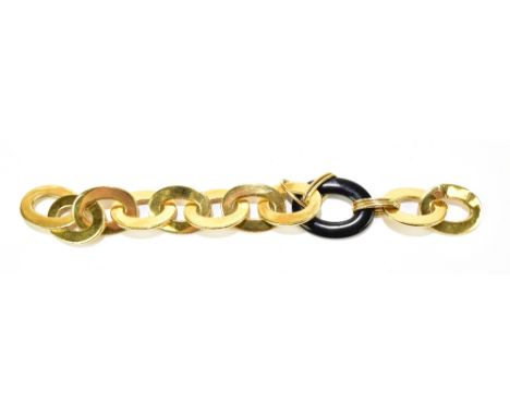 An Italian 18ct yellow gold and black onyx oval link bracelet, length approx 20cm, approx 41.3g, each of the gold oval panels