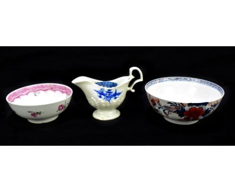 Two 18th century Liverpool porcelain slop bowls, decorated in the Bird on a Branch pattern, diameter 16.5cm, also a blue and 