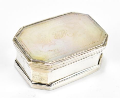 An unmarked Continental white metal and mother of pearl set snuff box of rectangular form, with canted corners and engraved l