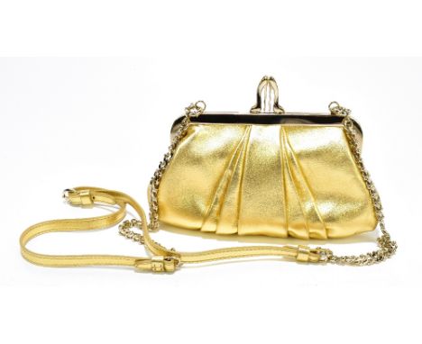 LOUBOUTIN; a gold nappa leather mini 'Loubi Lula' clutch, with gold tone Pigalle 120 clasp and a red jacquard woven satin int