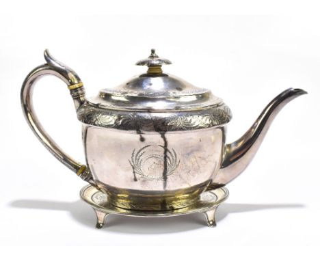 A George III&nbsp;hallmarked silver teapot and stand, each with chased floral sprays surrounding&nbsp;circular cartouche, eng