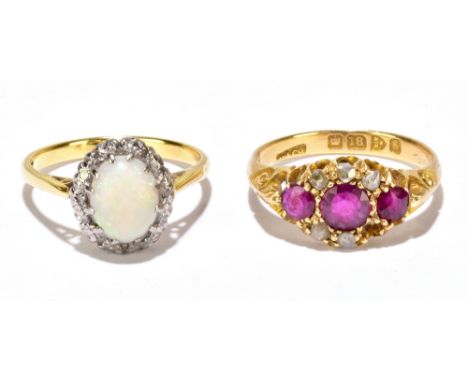 An Edwardian 18ct yellow gold ring, size J (af) and an 18ct yellow gold opal ring, size I, combined approx 4.7g (2).