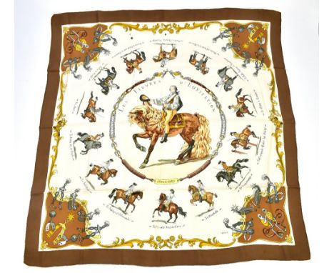 HERMES; a tan, gold and grey 100% silk scarf 'Les Figures D'equitation' by Ledoux, depicting different styles of riding, 90 x