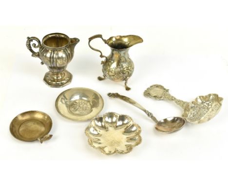 A group of 800 grade silver and white metal items including two dishes, a Dutch style sifting spoon, the cast handle with ins