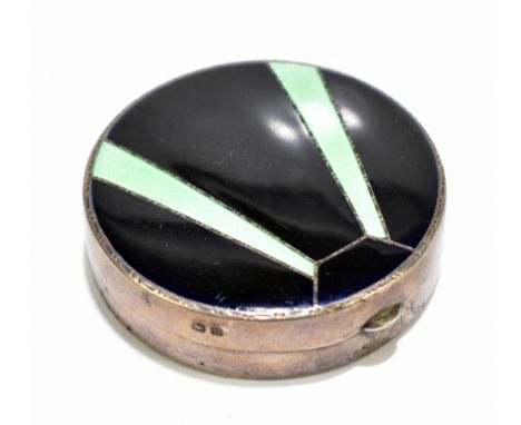 WILLIAM NEALE; a George V hallmarked silver and enamel compact of circular form, with black enamel cover with green geometric