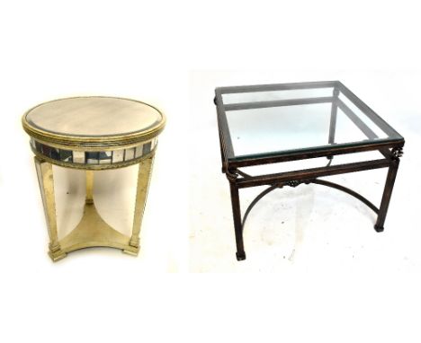 A contemporary gilt lamp table of circular form with mirrored top and gallery, raised on tapering block supports, height 66cm