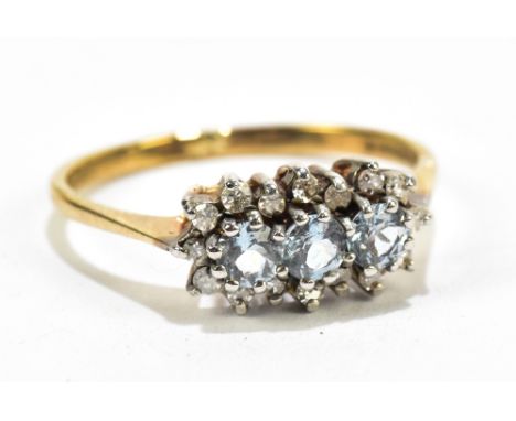 A 9ct yellow gold melee diamond ring with three central blue stones, approx size K, approx 1.3g.Additional InformationThe sto