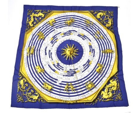 HERMES; a blue, gold and cream 100% silk scarf 'Astrologie Dies et Hore', designed by Francoise Faconnet, first issued in 196