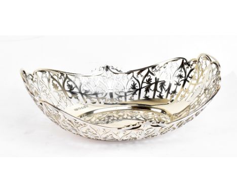 ROBERT PRINGLE &amp; SONS; a George V hallmarked silver bread basket of oval form with pierced floral decoration, London 1934