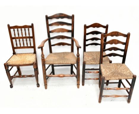 A 19th century rush seated ladder back armchair, a pair of ladder back chairs and a spindle back chair (4).