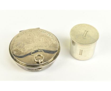 B &amp; W LTD; two George V hallmark silver pyx boxes, the larger hinged lid engraved with a cross and inscribed 'Rev. M.Finn