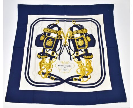 HERMES; a vintage 100% silk 'Brides de Gala' scarf designed by Hugo Grygkar, first issued 1957, printed with two bridles and 